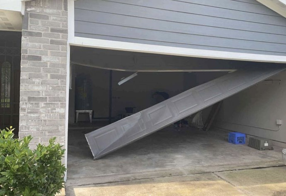 How Many Turns for Garage Door Spring? | Complete Winding Guide 2026 - Lemus Garage Door Services Katy TX
