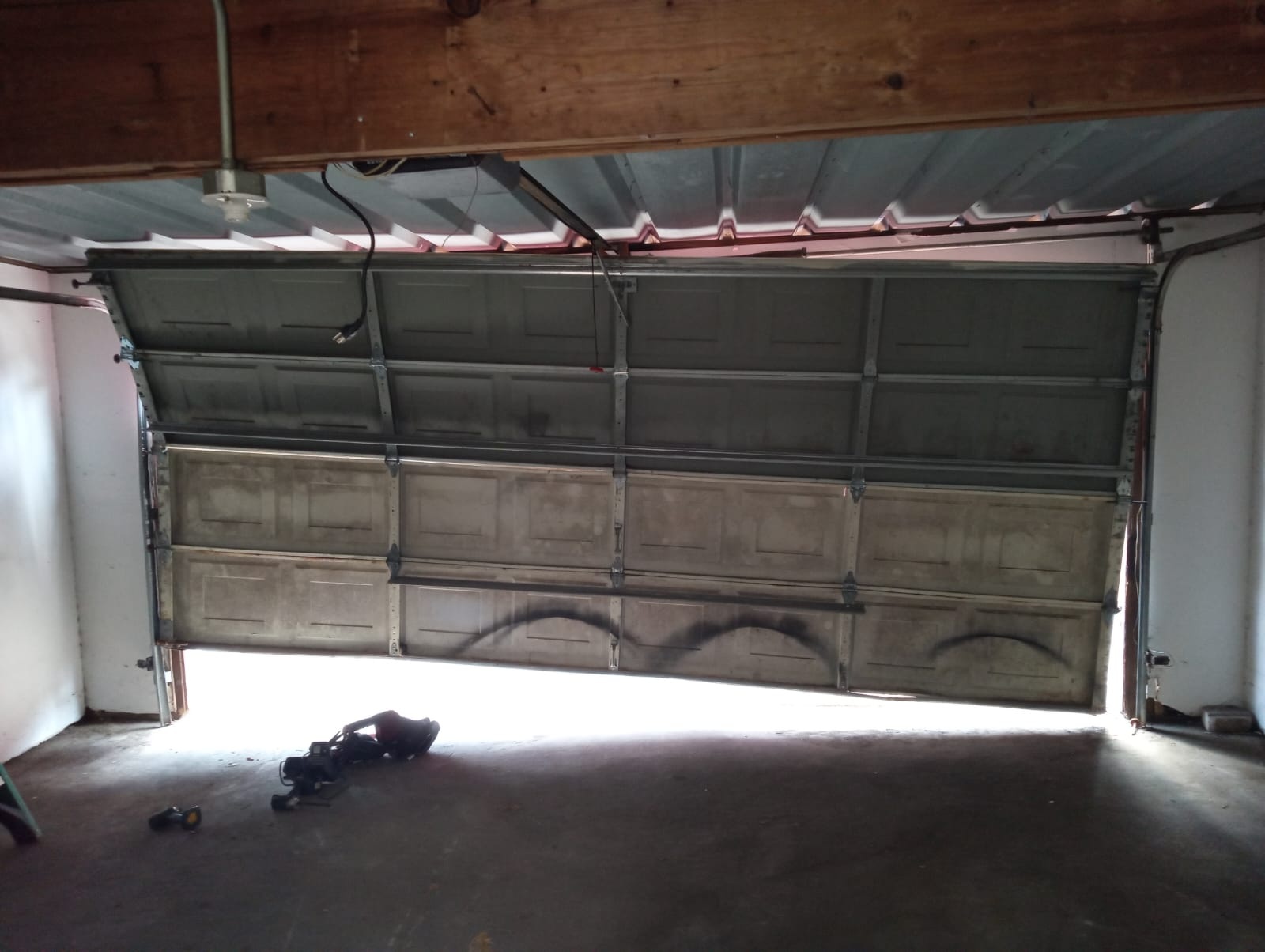 Torsion Spring Winding Bars Danger: Why DIY Can Kill | Katy TX - Lemus Garage Door Services Katy TX