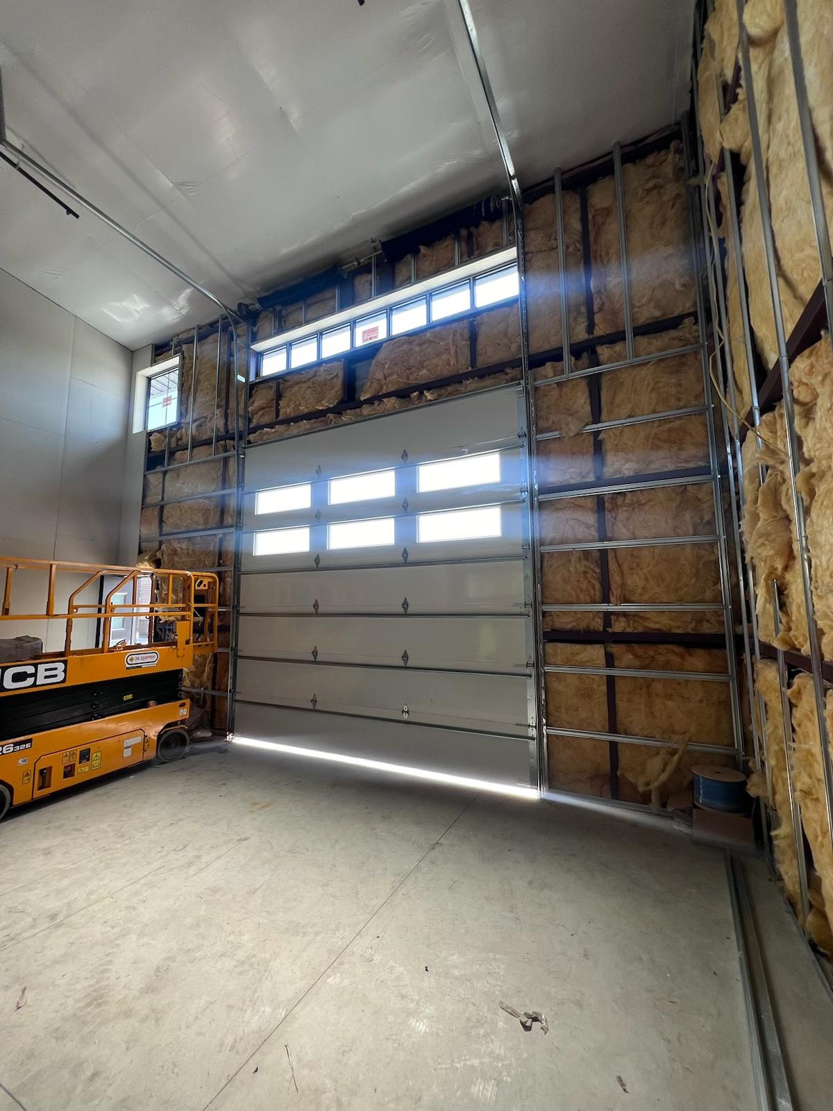 Garage Door Won't Close All the Way? Katy TX Troubleshooting Guide 2026 - Lemus Garage Door Services Katy TX